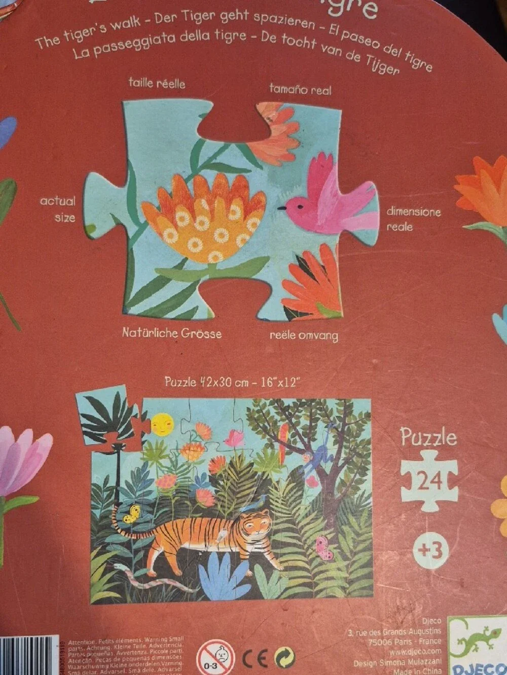 Tiger Shaped Puzzle with Flower Illustration